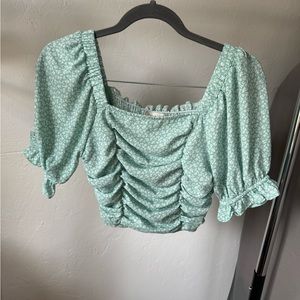 Femmine Size S green floral top